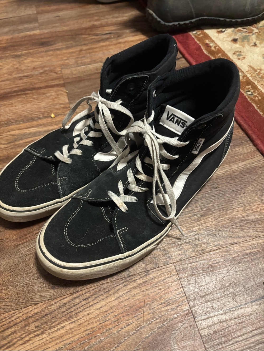 Vans Black and White High-Top Skate Sneakers